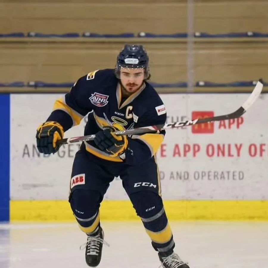 ABG Elite Skills founder Logan Acheson as captain of the Spruce Grove Saints AJHL hockey team.